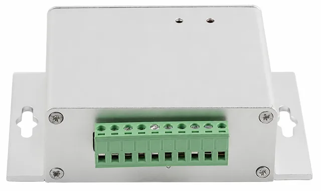 Supplier PDF photograph of an aluminium analog bridge amplifier with ten-position green terminal block, two top adjustment holes, four front fasteners and two keyhole mounting wings.